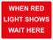Temporary Sign - When red light shows wait here